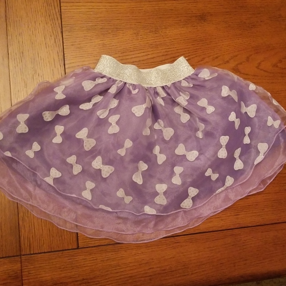 Richie House multilayered skirt with silvery bows